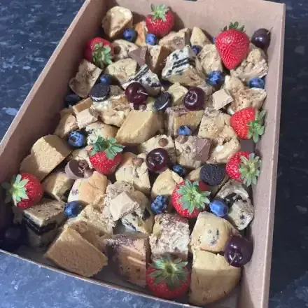Crumbology Grand Share cookie platter — 12 artisan loaded cookies quartered into 48 wedges